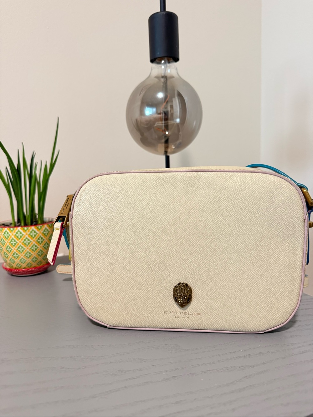 Kurt Geiger Ivory Crossbody with Pink Trim and Blue Strap.